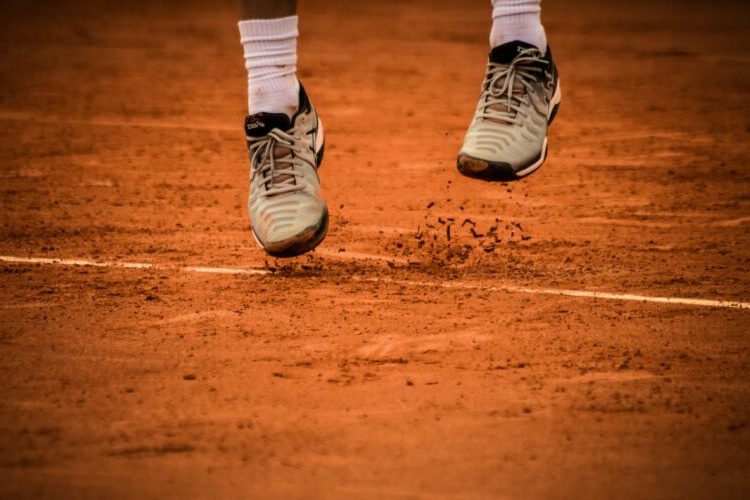 Feet with trainers jumping